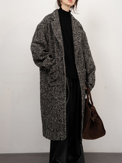 Manteau en laine bouclée et tweed 