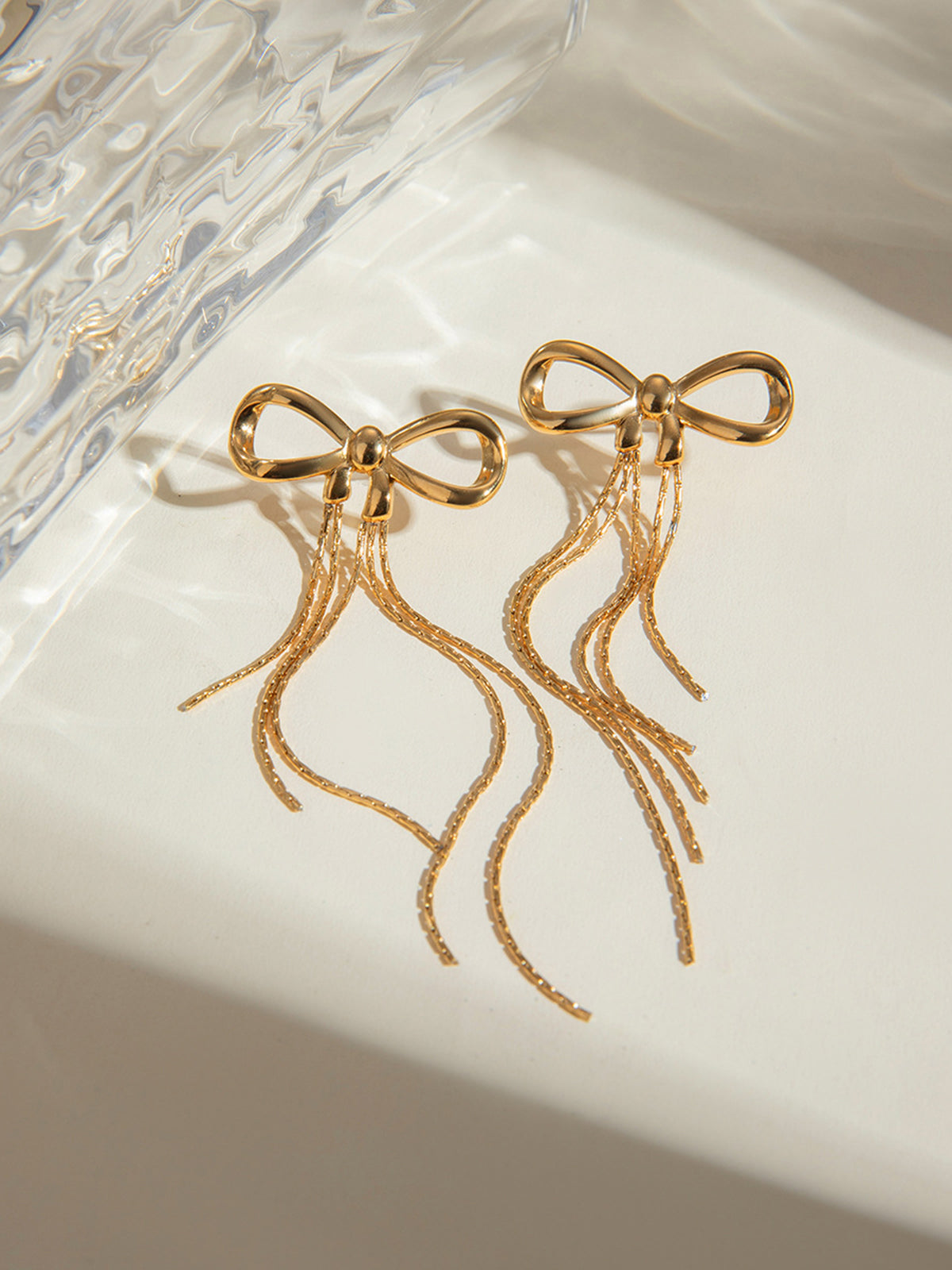 AMARE Boucles d'Oreilles Noeud Doré avec Franges