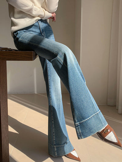 Pantalon en denim drapé slim délavé 