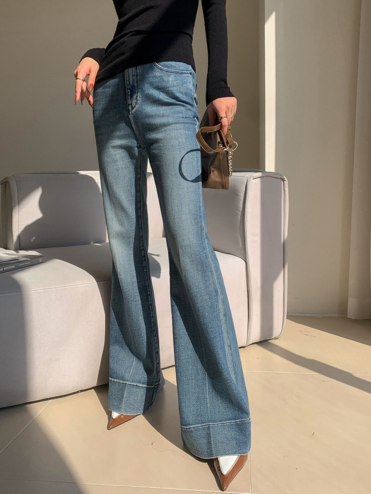 Pantalon en denim drapé slim délavé 