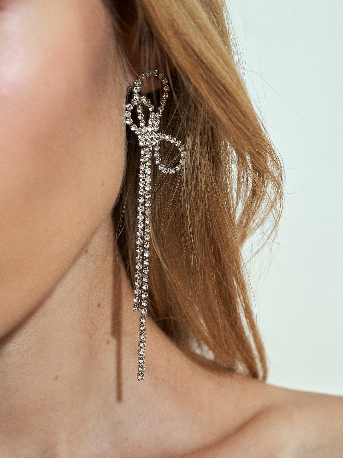 AMARE Boucles d'Oreilles Nœud à Franges en Rhinestones Étincelants